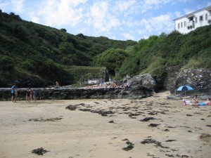 Locmaria small beach, overlooked by ancient manor house